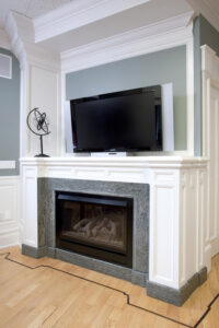 A fireplace with white frames