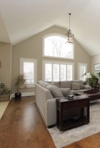 A living room with large windows